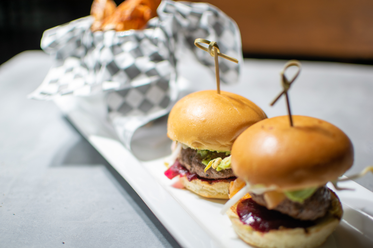 Lamburgers with a basket of fries